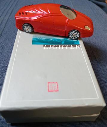 Exclusieve aansteker in de vorm van metalen sportauto. beschikbaar voor biedingen
