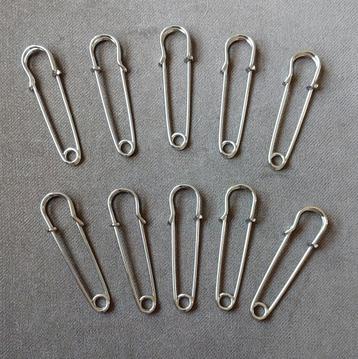 Sjaalspeld dasspeld vestsluiting kiltspeld zilver

 beschikbaar voor biedingen