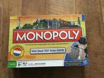 Monopoly spel van dam tot dom editie., Hobby en Vrije tijd, Gezelschapsspellen | Bordspellen, Ophalen of Verzenden, Zo goed als nieuw