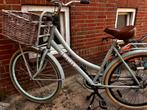 De fiets werkt goed en de banden zijn nieuw, met een mandje, Fietsen en Brommers, Fietsen | Dames | Damesfietsen, Ophalen, Zo goed als nieuw