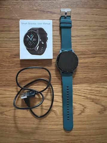 Smartwatch (rond) met mooie kunststof band beschikbaar voor biedingen