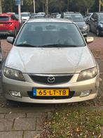 Mazda 323 1.6 SDN Touring AUT 2003 Grijs, Auto's, Mazda, Stof, Zwart, 400 kg, Origineel Nederlands