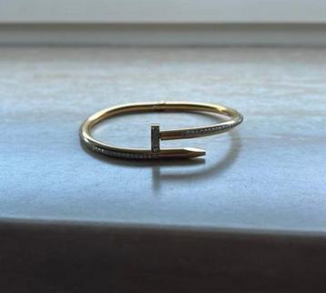 Spijker armband RVS goudkleurig beschikbaar voor biedingen