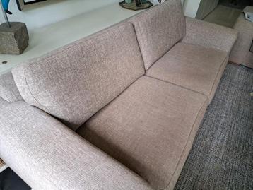 Beige gemêleerde stoffen banken