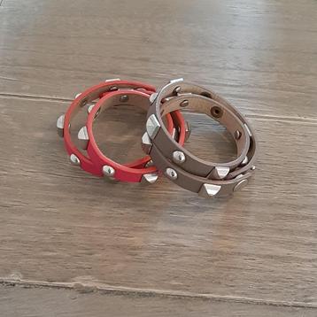 Armbandjes lederlook studs drukknoopjes roze en bruin beschikbaar voor biedingen