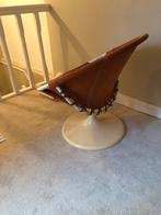 “ lusch” draaifauteuil gemerkt, Ophalen