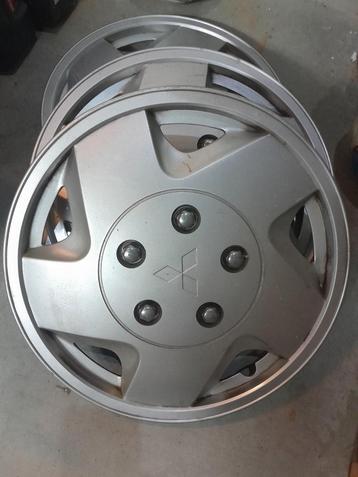 wieldoppen 16 inch van Mitsubishi beschikbaar voor biedingen
