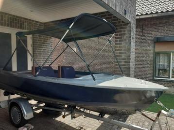 mooi bootje met trailer, mercury 7.5pk 2takt  en biminitop.  beschikbaar voor biedingen