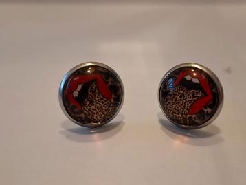 Oorbellen met luipaardprint en Rolling stones  beschikbaar voor biedingen