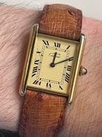 Must de Cartier Tank horloge - serviced, Ophalen of Verzenden, Zo goed als nieuw, Zwart, Android