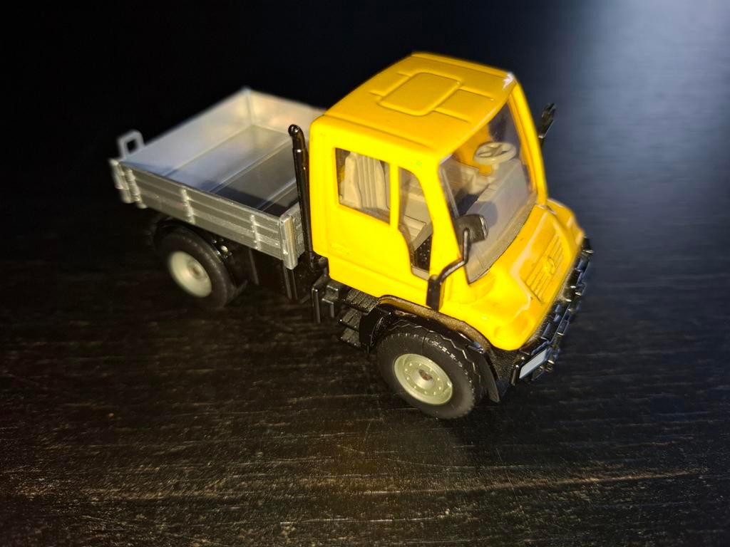 Siku Mercedes-Benz Unimog - Geel modelvoertuig, Overige merken, Gebruikt, 1:50 of kleiner, Ophalen of Verzenden