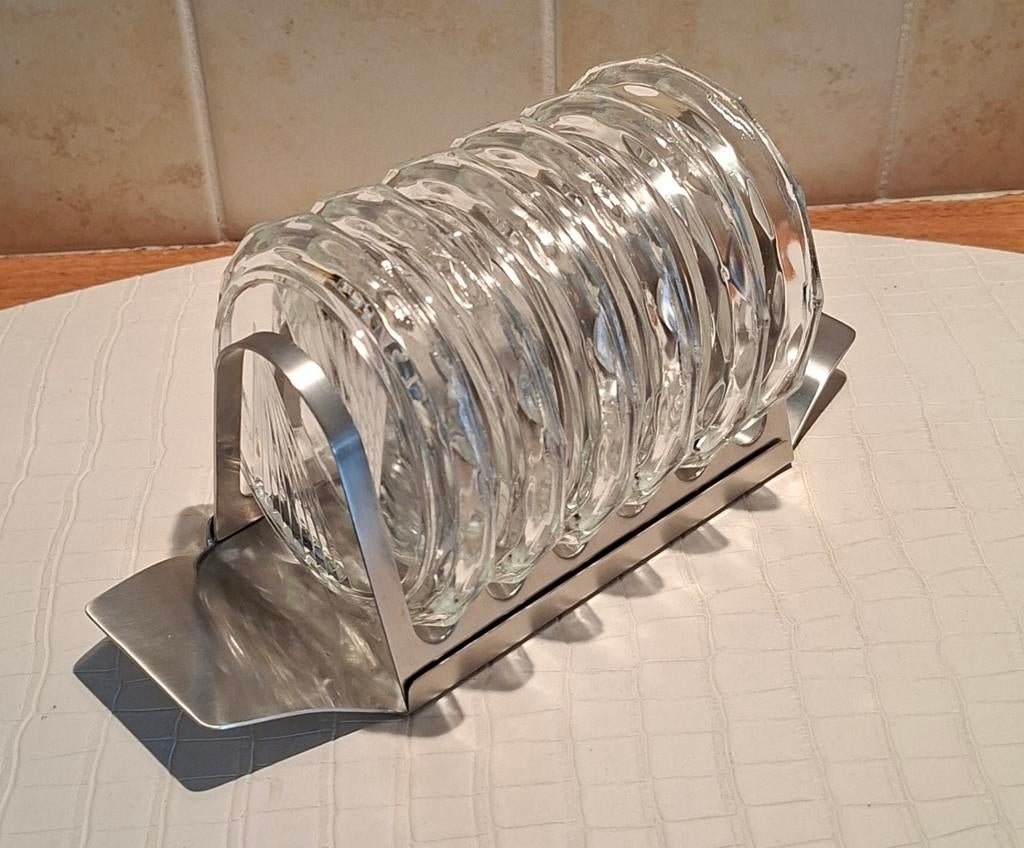 Glazen onderzetters in rekje (6 stuks), Ophalen of Verzenden, Gebruikt, Glas of Kopje