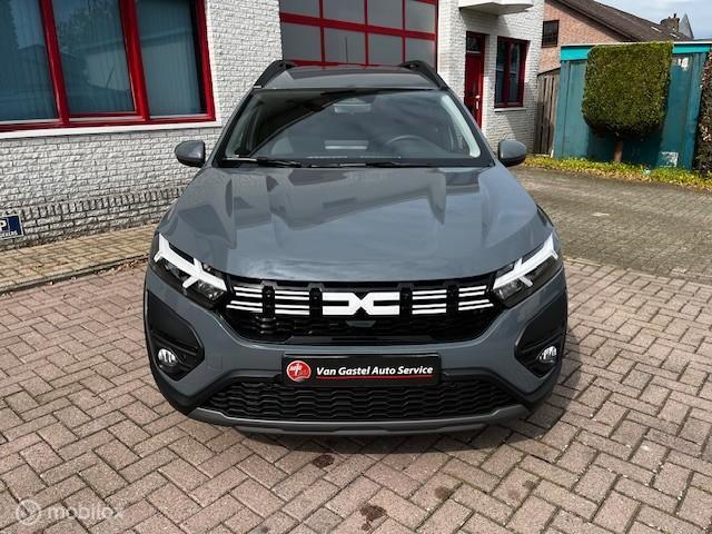 Dacia Jogger 1.6 Hybrid 140 Expression 7p., Auto's, Dacia, Stof, Gebruikt, Zwart, 4 cilinders