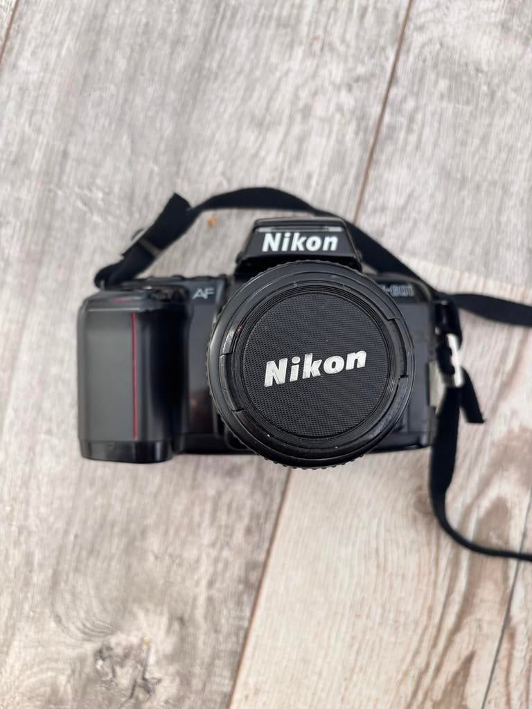 Nikon Analoge Spiegelreflexcamera + 35-70mm lens + Film, Audio, Tv en Foto, Fotocamera's Analoog, Ophalen of Verzenden, Niet werkend