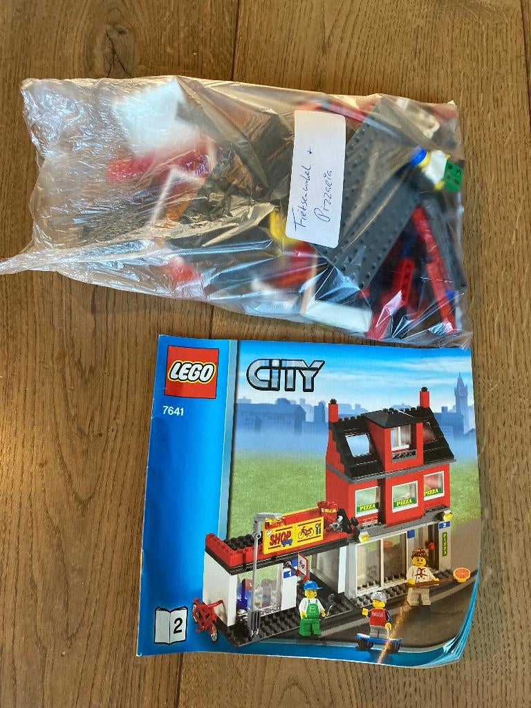 Aangeboden LEGO City De Straathoek - 7641, Kinderen en Baby's, Speelgoed | Duplo en Lego, Ophalen, Zo goed als nieuw, Complete set
