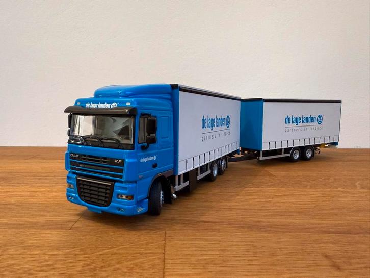 WSI DAF XF105 Space Cab 6x2 schuifzeilcombi Lage Landen 1:50, Hobby en Vrije tijd, Modelauto's | 1:50, Zo goed als nieuw, Bus of Vrachtwagen