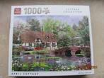NIEUWSTAAT Cottage Collection PUZZEL 1000 stukjes KING April, Ophalen of Verzenden, 500 t/m 1500 stukjes, Zo goed als nieuw, Legpuzzel