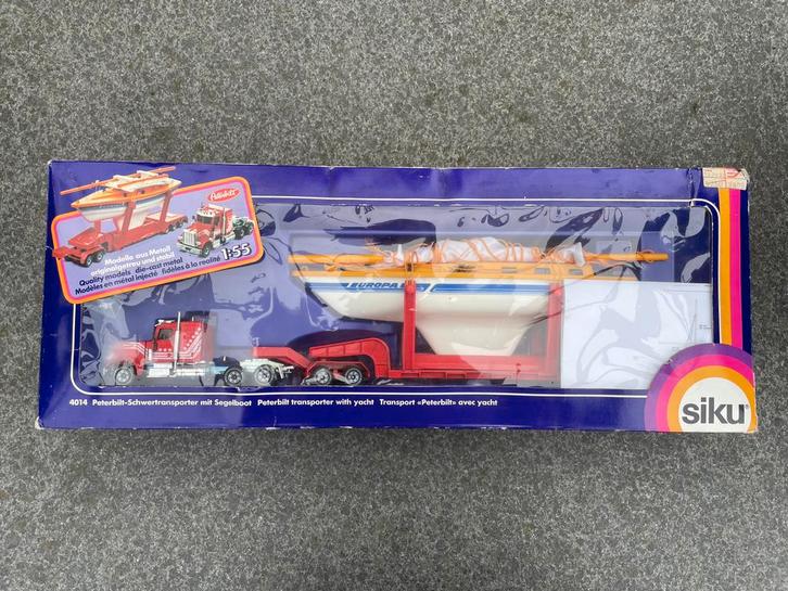 Siku 4014 - Peterbilt met zeilboot, Hobby en Vrije tijd, Modelauto's | 1:50, Nieuw, Bus of Vrachtwagen, SIKU, Ophalen of Verzenden