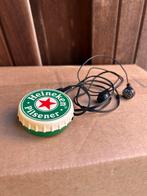 Heineken radiotje kroonkurk, Ophalen