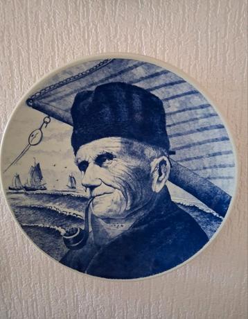 Wandbord met afbeelding van een visser beschikbaar voor biedingen