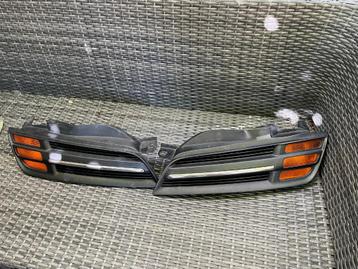Set grilletjes met oranje knippers Micra 2004 beschikbaar voor biedingen