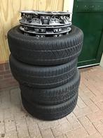 Set Pirelli winterbanden op stalen velgen met wieldoppen, Ophalen