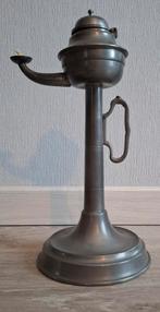 Tinnen olielamp- snotneus, Ophalen