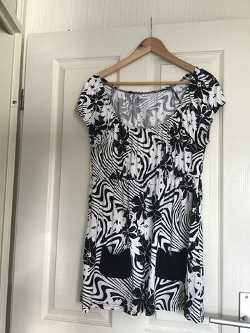 Heerlijke tuniek( Mt 40/42) beschikbaar voor biedingen