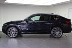 BMW X4 xDrive20i High Executive M Sport Automaat / Trekhaak, 1998 cc, 4 cilinders, Met garantie (alle), Zwart