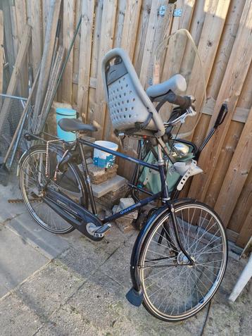 Fiets met voor kinderzitje beschikbaar voor biedingen