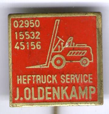 Heftruck Service J. Oldenkamp rood op koper speldje( F_022 ) beschikbaar voor biedingen