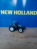 New holland TS135A, Hobby en Vrije tijd, Modelauto's | 1:32, Ophalen of Verzenden, Zo goed als nieuw, Tractor of Landbouw, ERTL