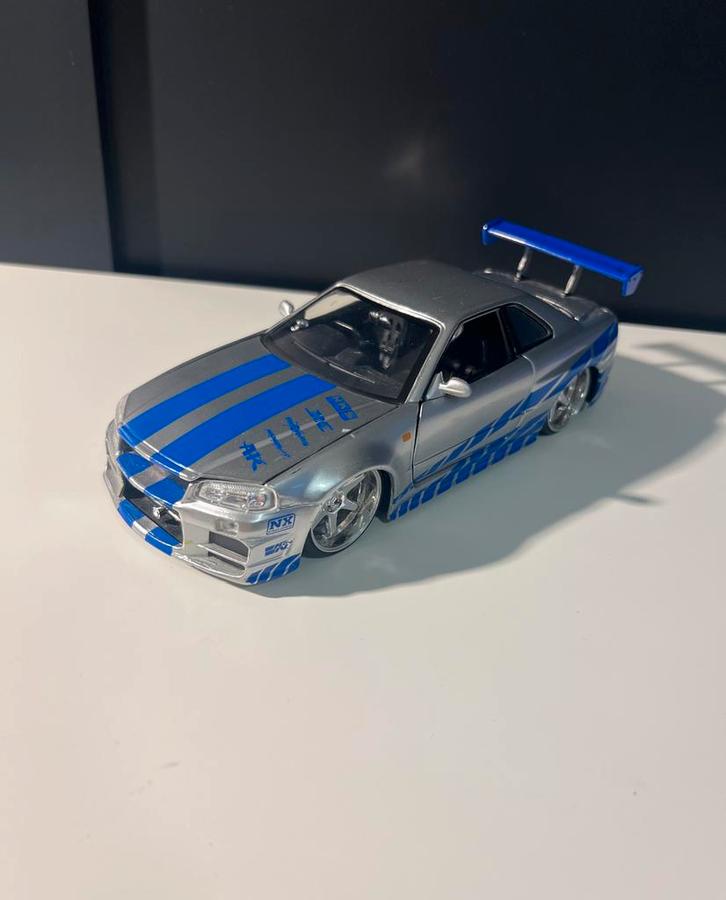 93. Nissan Skyline GTR R34 Modelauto 1:24, Hobby en Vrije tijd, Modelauto's | 1:24, Zo goed als nieuw, Auto, Overige merken, Ophalen of Verzenden