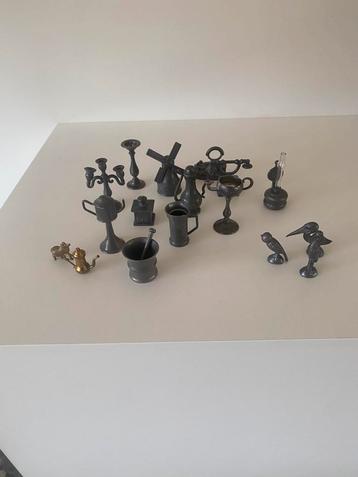 Tinnen figuurtjes beschikbaar voor biedingen