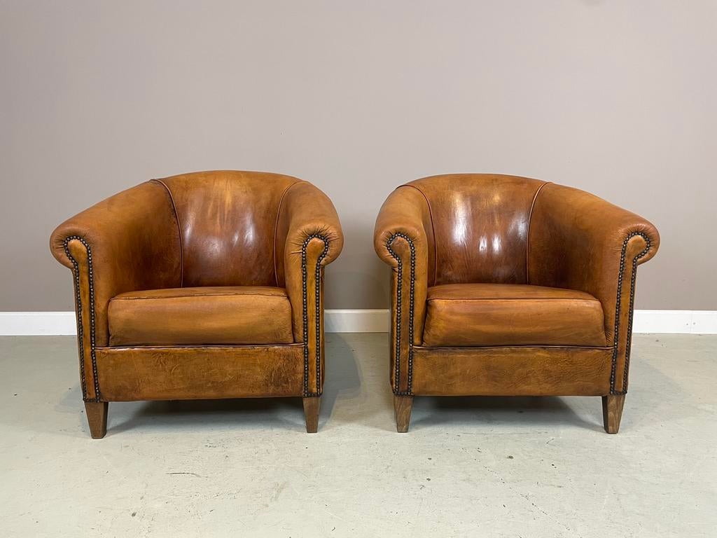 Schapenleren clubfauteuils DNG in zeer goede staat, Ophalen, Zo goed als nieuw, Leer