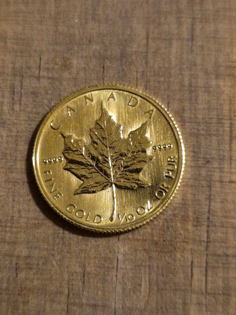 Canadese Gouden Maple Leaf 1/10 oz 1986, Postzegels en Munten, Edelmetalen en Baren, Ophalen of Verzenden, Goud