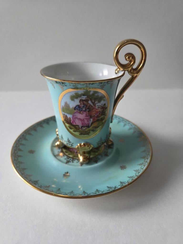 Limoges kop en schotel met gouden details, Antiek en Kunst, Ophalen of Verzenden