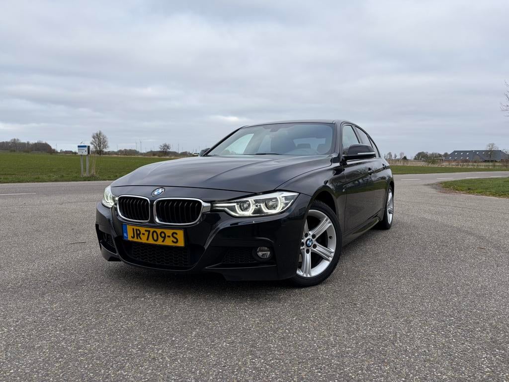 BMW 3-Serie 318i 136pk Aut 2016 Zwart, Auto's, BMW, Automaat, Zwart, Zwart, Origineel Nederlands