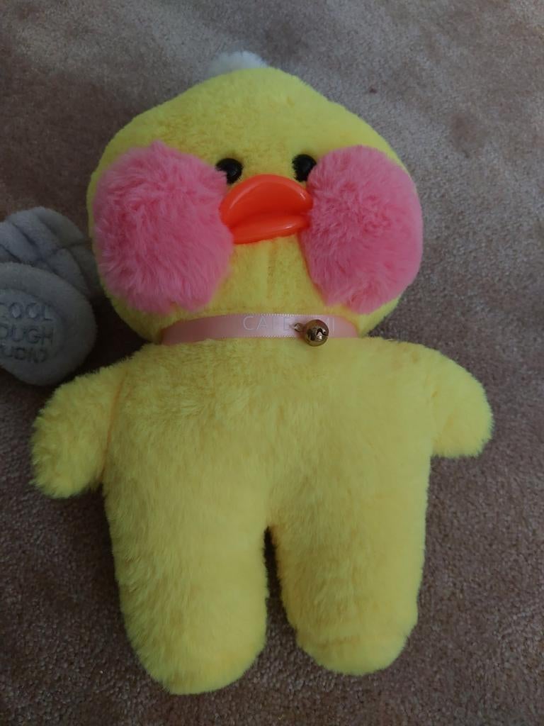Gele eend knuffel met hoofdband, Ophalen