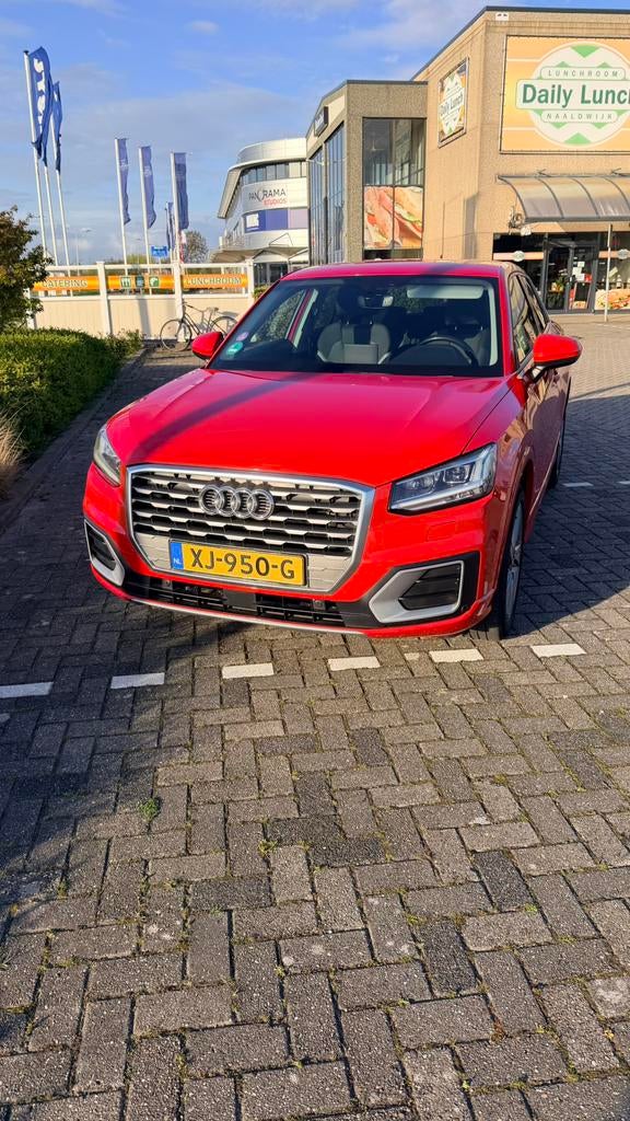 Audi Q2 1.0 Tfsi 116pk 2019 Rood, Auto's, Voorwielaandrijving, Q2, Origineel Nederlands, Particulier