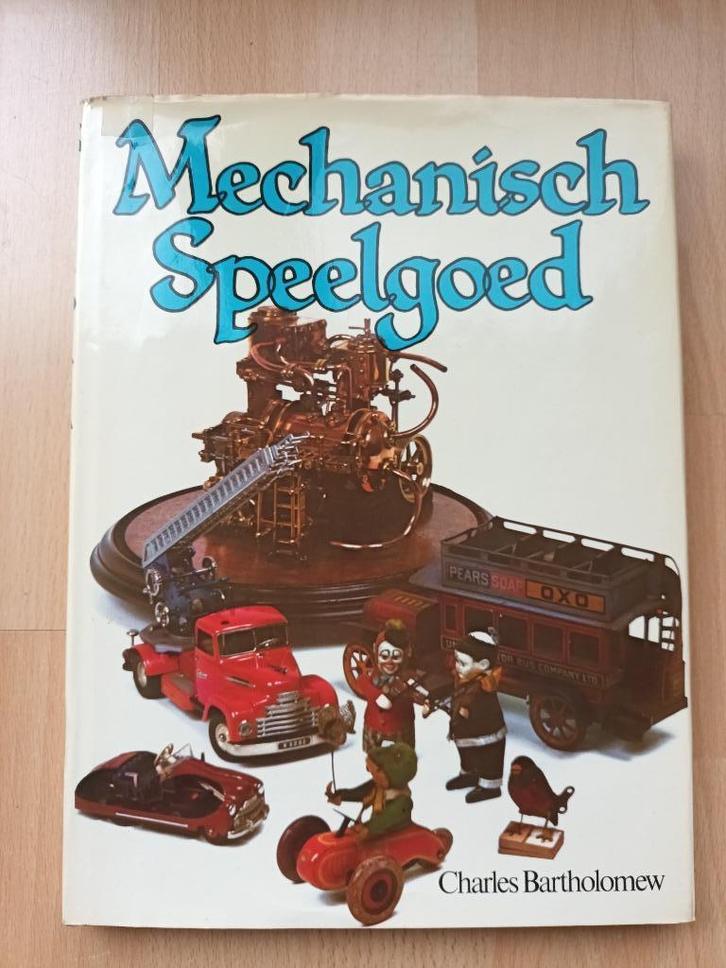 Boek over mechanisch speelgoed, Antiek en Kunst, Antiek | Speelgoed, Ophalen of Verzenden