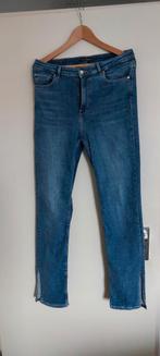 Jeans met Split maat 32 beenlengte 82 cm, Ophalen of Verzenden, Zo goed als nieuw