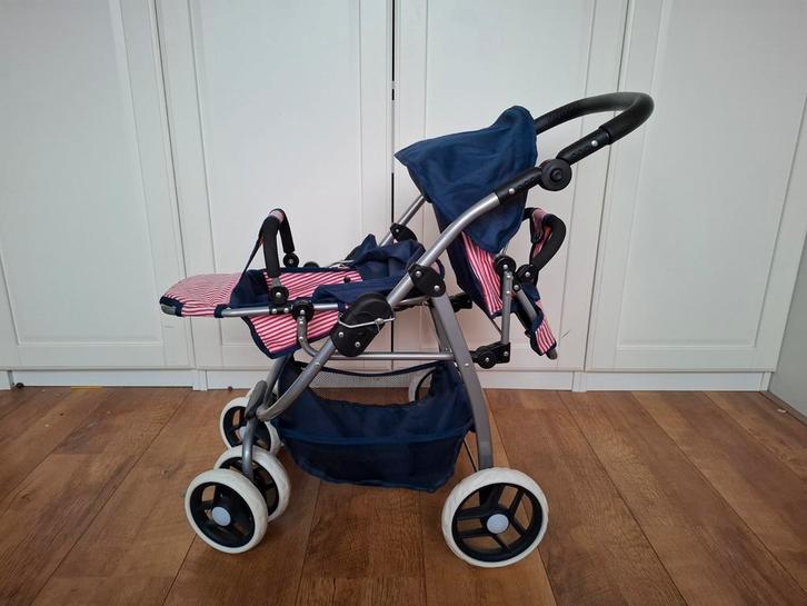 Tweelingbuggy met omkeerbaar zitje, Kinderen en Baby's, Speelgoed | Poppen, Zo goed als nieuw, Babypop, Ophalen of Verzenden
