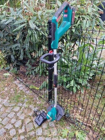 Bosch bosmaaier 36V met accu en lader. beschikbaar voor biedingen