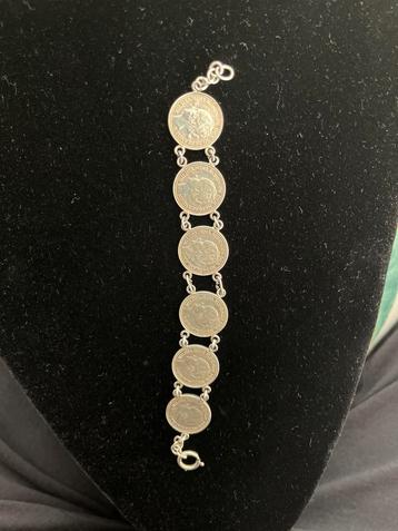 Unieke armband met zilvere muntjes Koningin Wilhelmina, 1941 beschikbaar voor biedingen