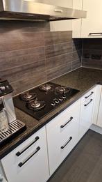 Granieten aanrechtblad met kookplaat, kraan en spoelbak, Ophalen