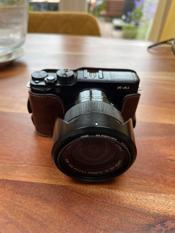 Fuji X-A1 met zoomlens 16-50 mm 1:3,5 - 5,6 OIS beschikbaar voor biedingen