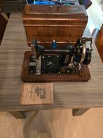 Antieke victoria naaimachine, Ophalen