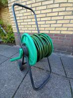 slangenhaspel met tuinslang, Ophalen, Gebruikt, Tuinslang