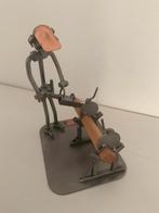 Metalen kunst - Hout zagen, Ophalen, Zo goed als nieuw, Mens